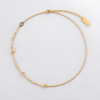 Collier avec initiale latérale