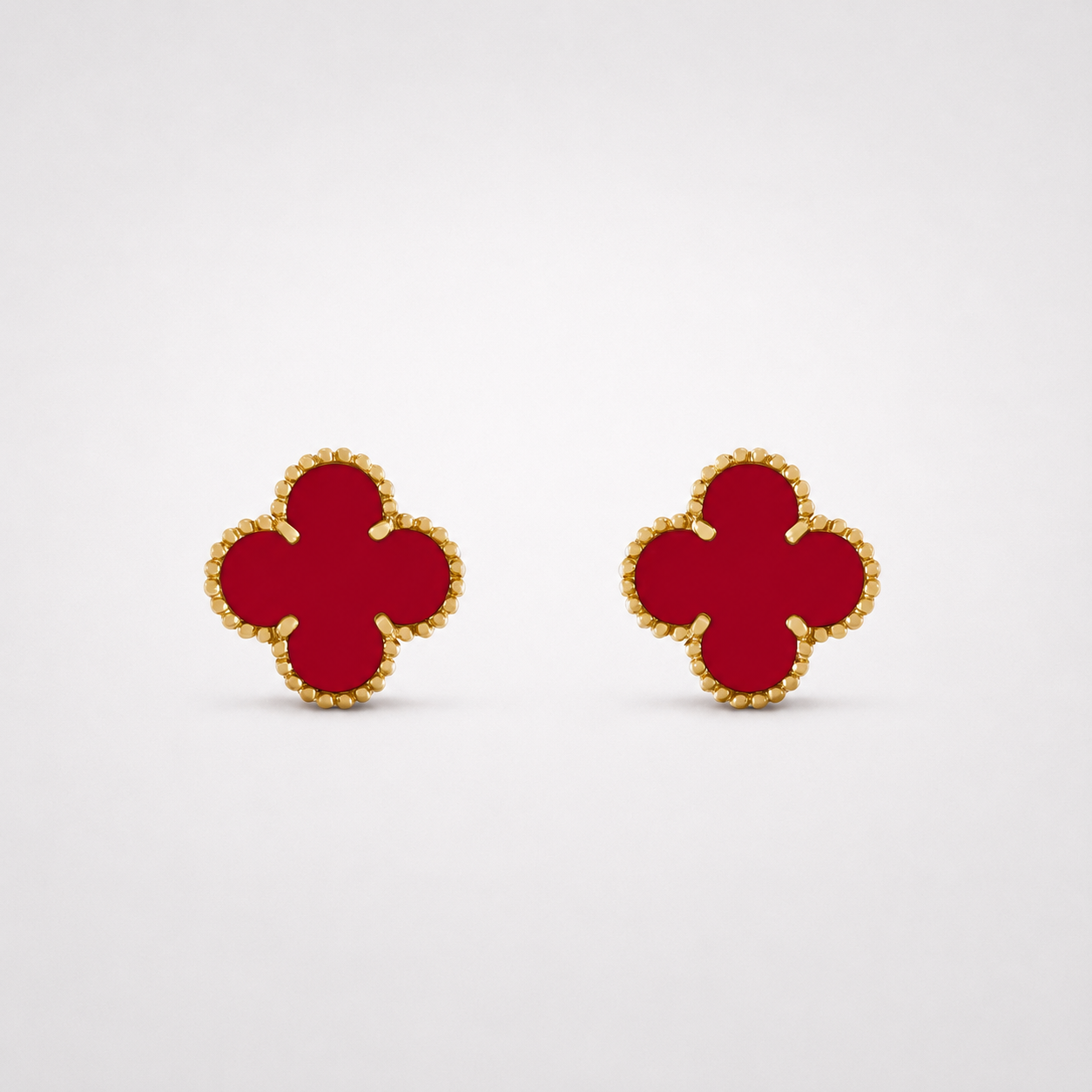 Les boucles d'oreilles trèfle
