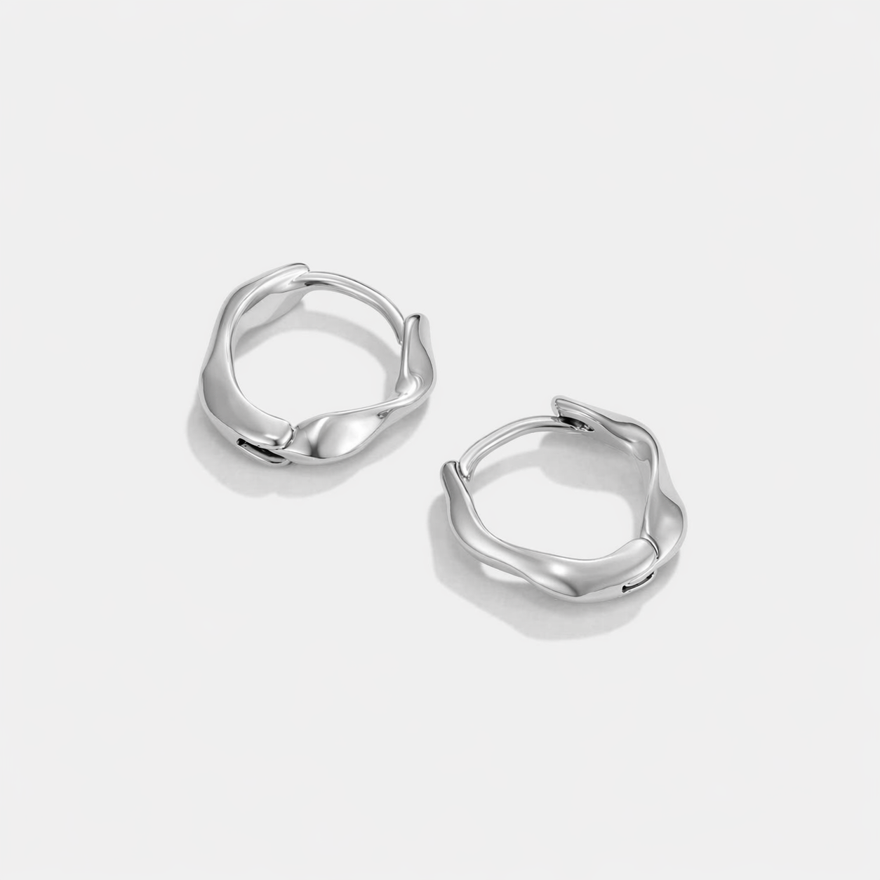 Corinne Twisting Hoop Earrings