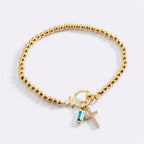 Cross Charm Birthstone Bracelet