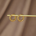 Lina Gold Twist Earrings