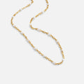 The White Beaded Necklace