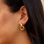 Arla Twisting Gold Hoop Earrings